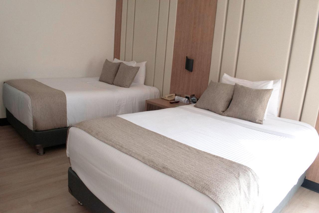 Hotel Dann Carlton Belfort Medellin Exterior photo A room at the hotel