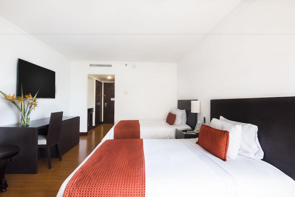 Hotel Dann Carlton Belfort Medellin Exterior photo A room at the hotel